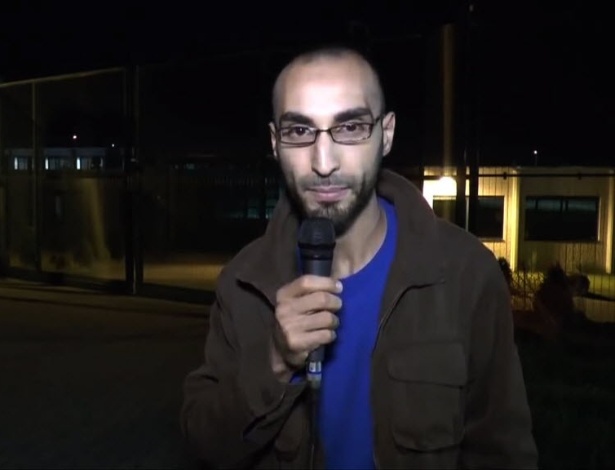 Imagem de um vídeo retirado do YouTube mostra o terceiro suspeito de ataque ao aeroporto de Bruxelas, Faycal Cheffou, que se declara jornalista independente - AFP/YouTube