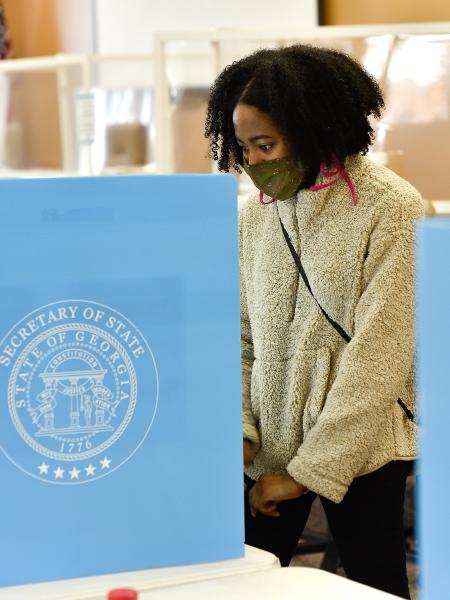 Eleitores da Geórgia vão às urnas para votar para o Senado - Virginie Kippelen/ AFP