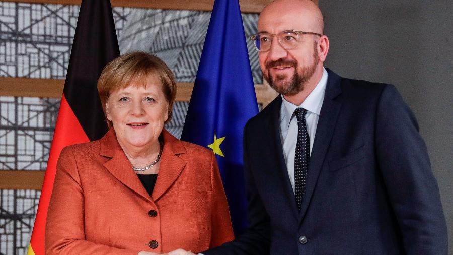 12.dez.2019 - A chanceler da Alemanha, Angela Merkel, e o presidente do Conselho Europeu, Charles Michel, em evento da UE - Stephanie Lecocq/Pool/AFP