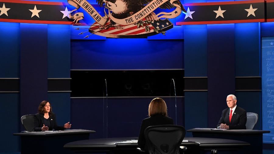 O vice-presidente dos Estados Unidos, Mike Pence, e a candidata à vice-presidência, Kamala Harris, falam durante o debate realizado na Universidade de Utah, em Salt Lake City (Utah) - Eric Baradat / AFP