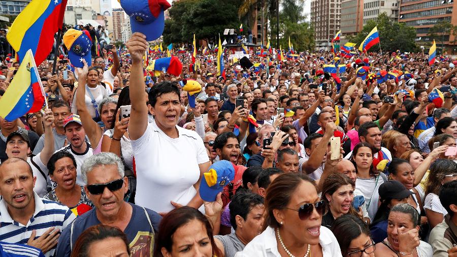 23.jan.2019 - Partidários da oposição venezuelana saem às ruas para protestar contra o governo do presidente Nicolas Maduro - REUTERS/Carlos Garcia