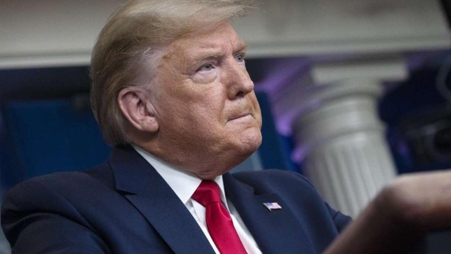 Donald Trump aparece atrás nas pesquisas para a eleição americana no próximo mês - JIM WATSON/AFP