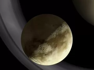 Maior lua de Saturno surpreende cientistas com espessa camada de gelo de metano