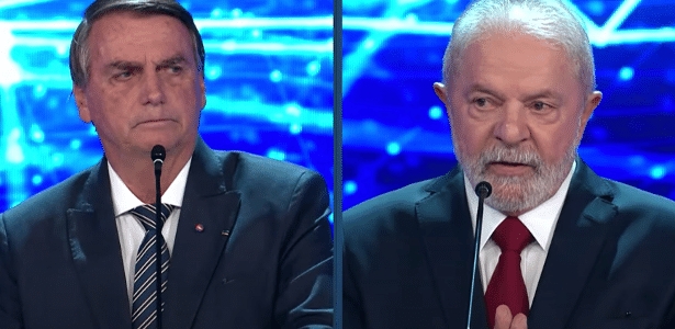 Jair Bolsonaro (PL) e Lula (PT) durante o debate na Band