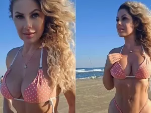 Influencer naturista é criticada por "viver de biquíni" e rebate: "Meu trabalho"