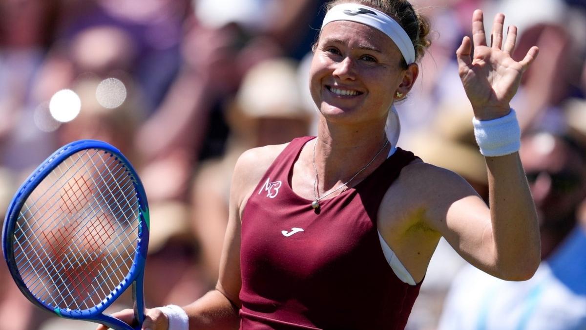 Bouzkova inicia defesa do título em Praga com dura vitória