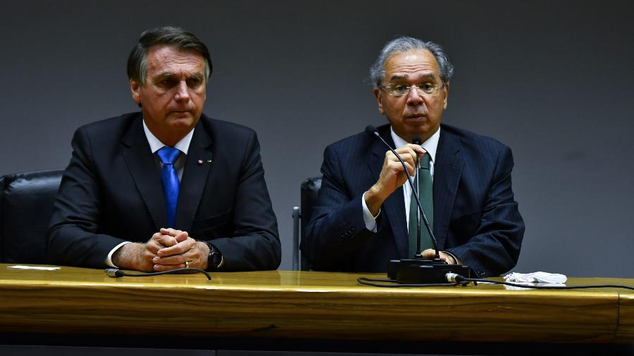 O Presidente Jair Bolsonaro visita o Ministro Paulo Guedes e participa de coletiva de imprensa. Na foto, Presidente Jair Bolsonaro e Ministro da Economia Paulo Guedes - Antonio Molina/Fotoarena/Estadão Conteúdo