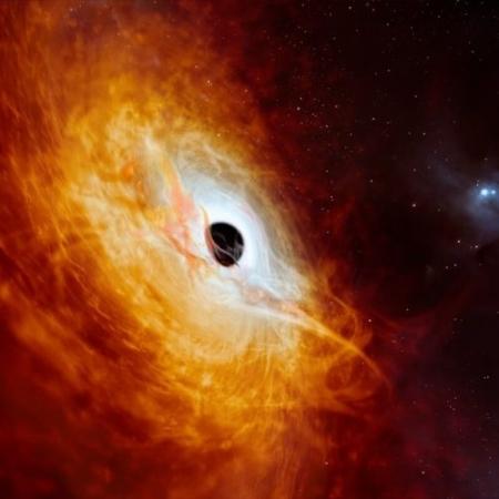 Quasar brilhante é alimentado por buraco negro que devora “um sol por dia”