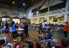 Correios: Recebimento de roupas doadas às vítimas das enchentes no RS estão suspensas - Gustavo Mansur - Palacio Piratini