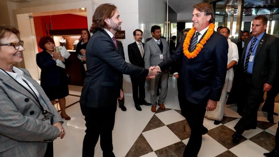 Vicente Santini cumprimenta o presidente Jair Bolsonaro  -  Presidência da República/Alan Santos 
