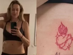 Após fazer mistério, Luana Piovani exibe nova tatuagem e explica significado: 'Fé'