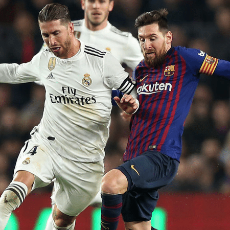 Sergio Ramos e Messi atuando por Real Madrid e Barcelona - GettyImages