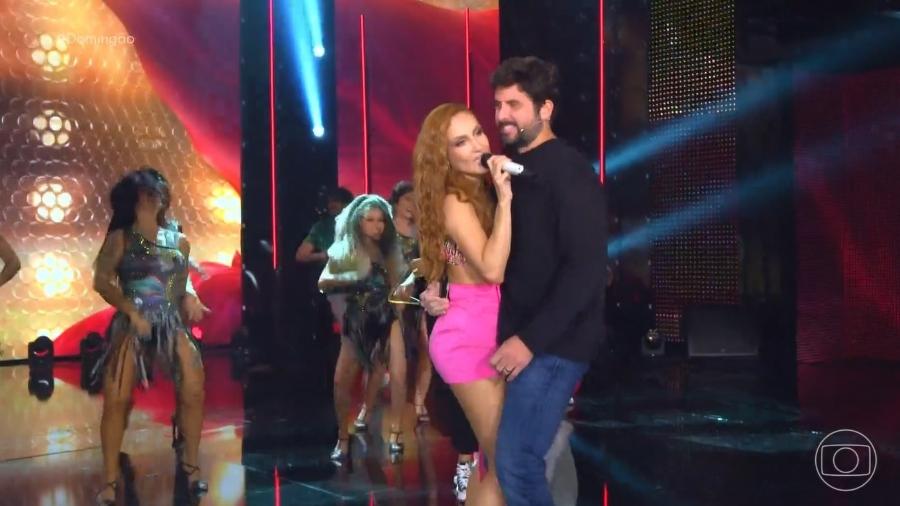 O empresário Márcio Pedreira dançou com Claudia Leitte no "Domingão" - Reprodução/TV Globo