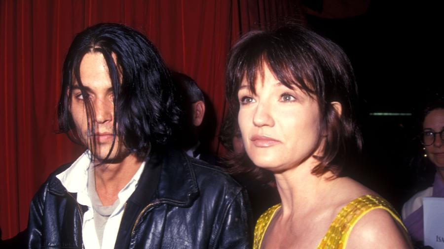 Johnny Depp e a atriz Ellen Barkin - Barry King/WireImage