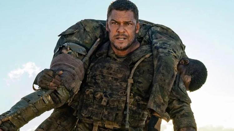 Alan Ritchson em cena do filme 'Máquina do Guerra' (2026) Alan Ritchson em cena do filme 'Máquina do Guerra' (2026)