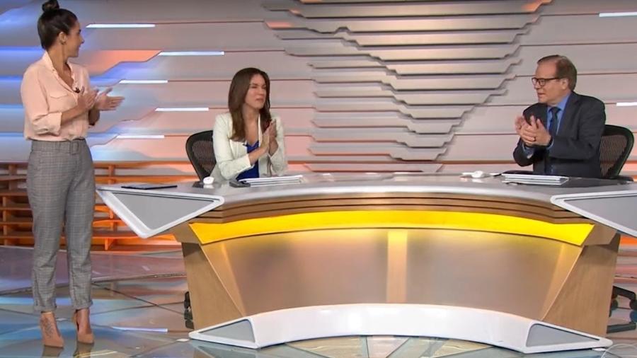Carol Barcellos, Ana Paula Araújo e Chico Pinheiro aplaudem Cristiana Lôbo ao vivo - Reprodução/TV Globo