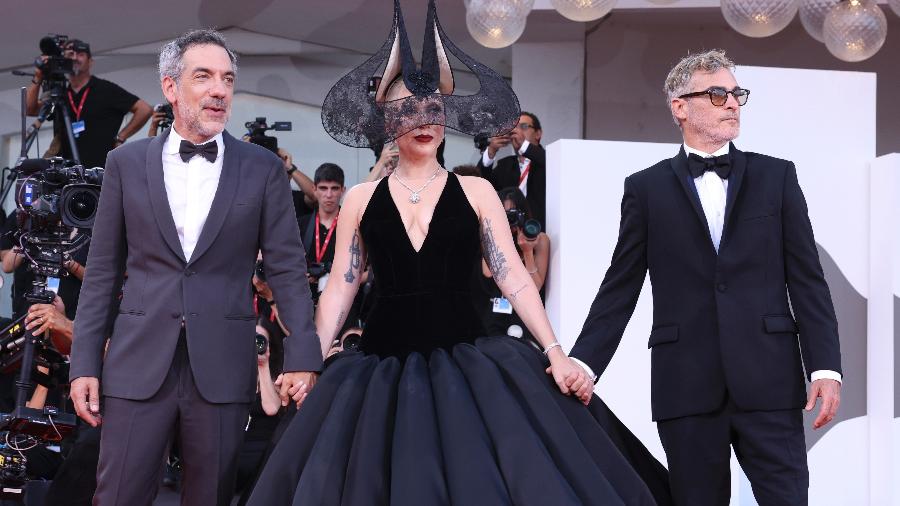 Lady Gaga, Joaquin Phoenix e o diretor Todd Phillips na première de "Coringa 2" em Veneza