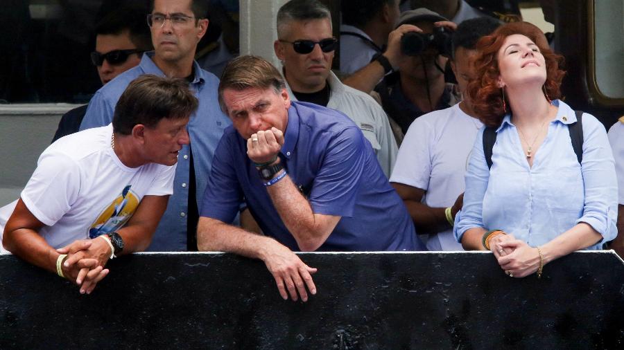 Jair Bolsonaro no barco durante o Círio de Nazaré, em Belém - Raimundo Pacco/Reuters