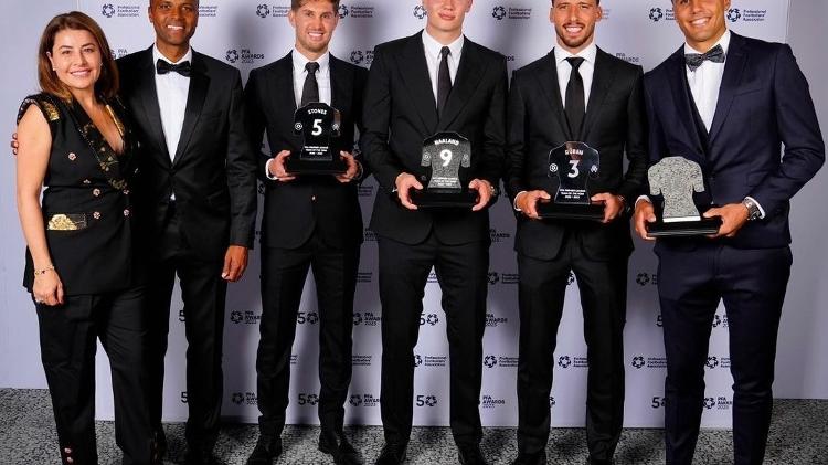 Rafaela Pimenta e os jogadores Stones, Erling Haaland, Rúben Dias e Rodri, do Manchester City